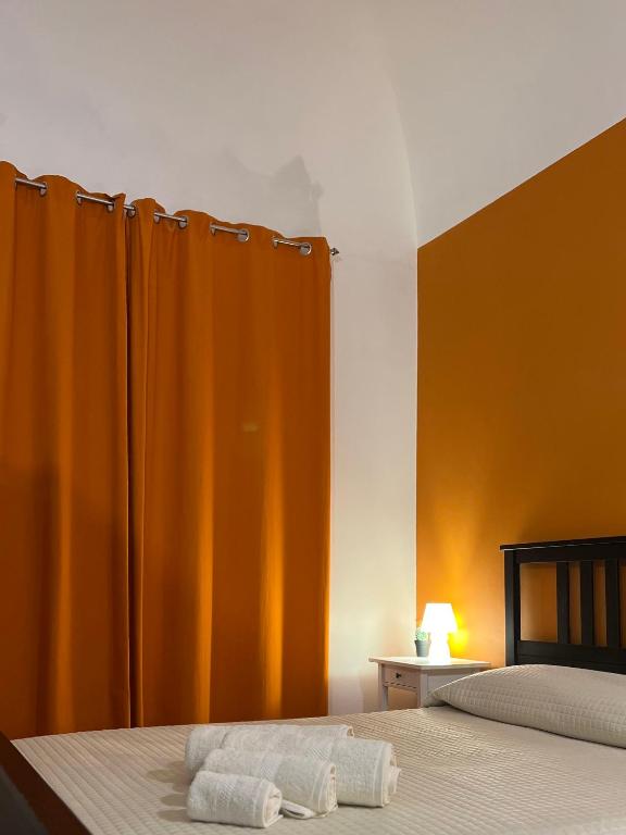 Postel nebo postele na pokoji v ubytování Ricasoli28Apartaments