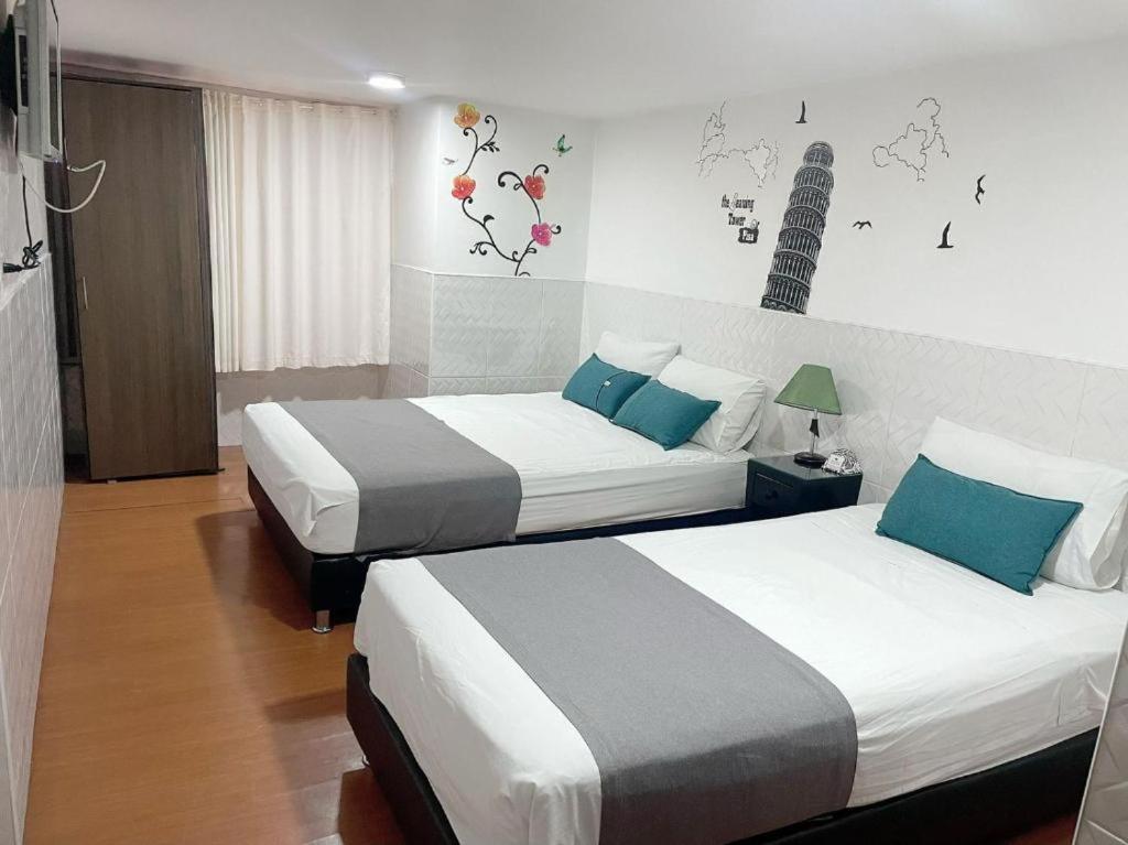 Postel nebo postele na pokoji v ubytování Hotel Boutique Radel