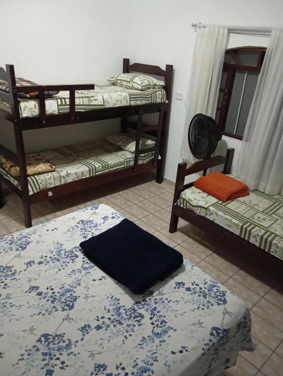 Postel nebo postele na pokoji v ubytování Hostel Brasil Gru