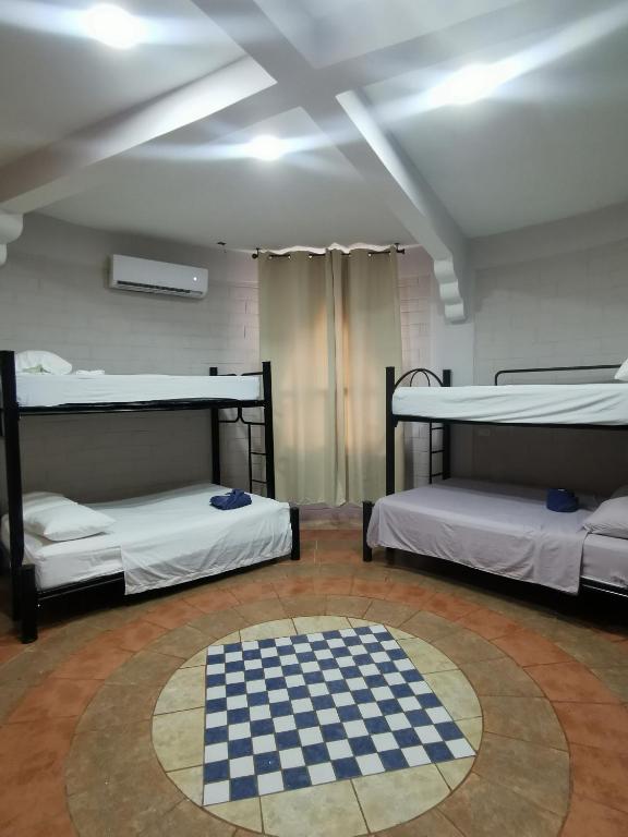 Postel nebo postele na pokoji v ubytování Mitico El Castillo