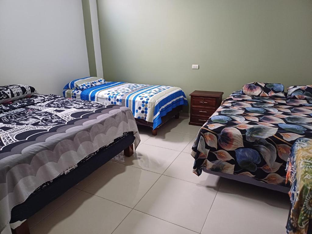 Postel nebo postele na pokoji v ubytování Casa Puka