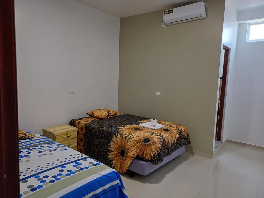 Postel nebo postele na pokoji v ubytování Casa Puka