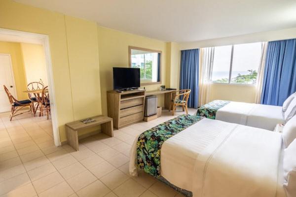 Postel nebo postele na pokoji v ubytování GHL Relax Hotel Costa Azul