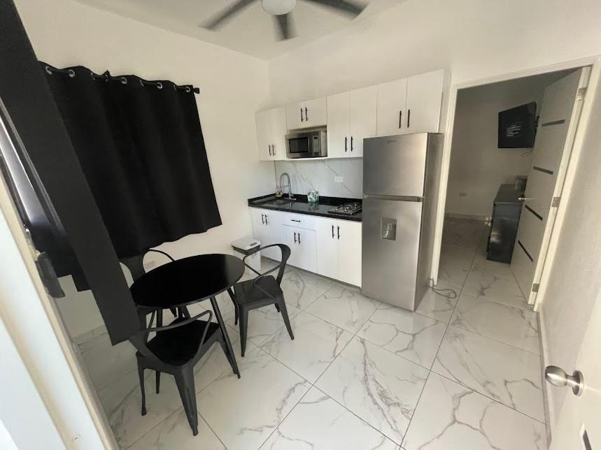 Kuchyň nebo kuchyňský kout v ubytování LEVEL suites #7