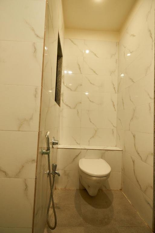 Koupelna v ubytování Hotel Pride Inn Shirdi