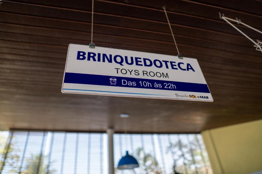 Um certificado, prêmio, placa ou outro documento exibido em Pousada Sol e Mar