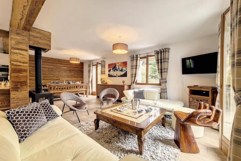 TV a/nebo společenská místnost v ubytování Résidence Le Bettex - Chalet CRISTAL MAE-0654