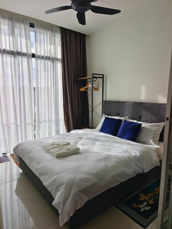 Postel nebo postele na pokoji v ubytování Kinabalu 2 Home stay The Shore KK