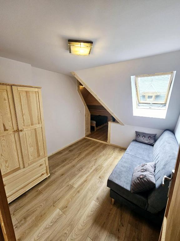 Posteľ alebo postele v izbe v ubytovaní Apartament Antonio