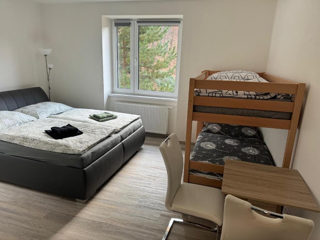 Postel nebo postele na pokoji v ubytování Vila Tanvald s wellness a wallboxem