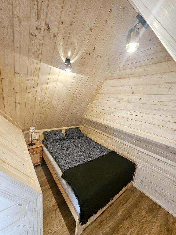 Posteľ alebo postele v izbe v ubytovaní Apartament Antonio