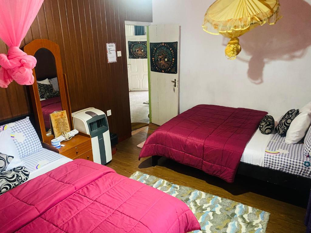 Postel nebo postele na pokoji v ubytování Tunnel Gap Homestay