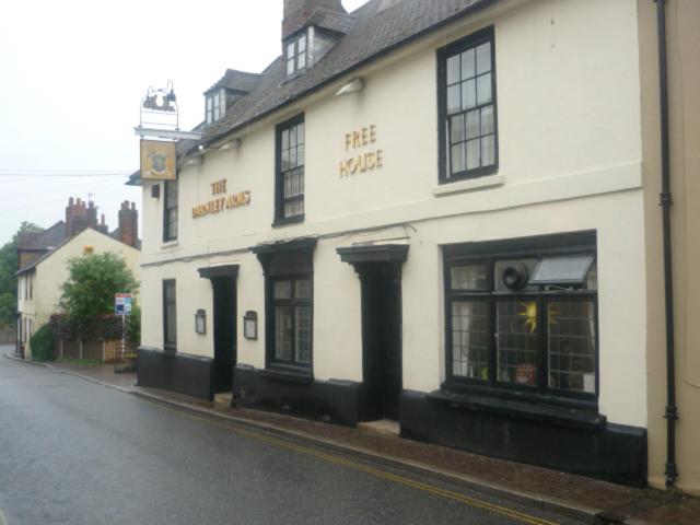 a white building on the side of a street at The Darnley Arms in Gravesend