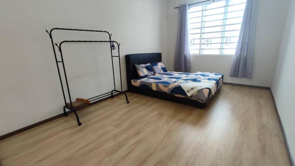 Postel nebo postele na pokoji v ubytování ZALFIA Homestay