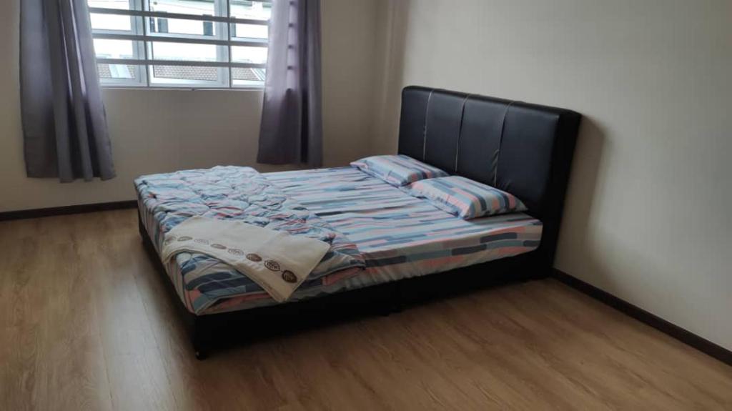 Postel nebo postele na pokoji v ubytování ZALFIA Homestay