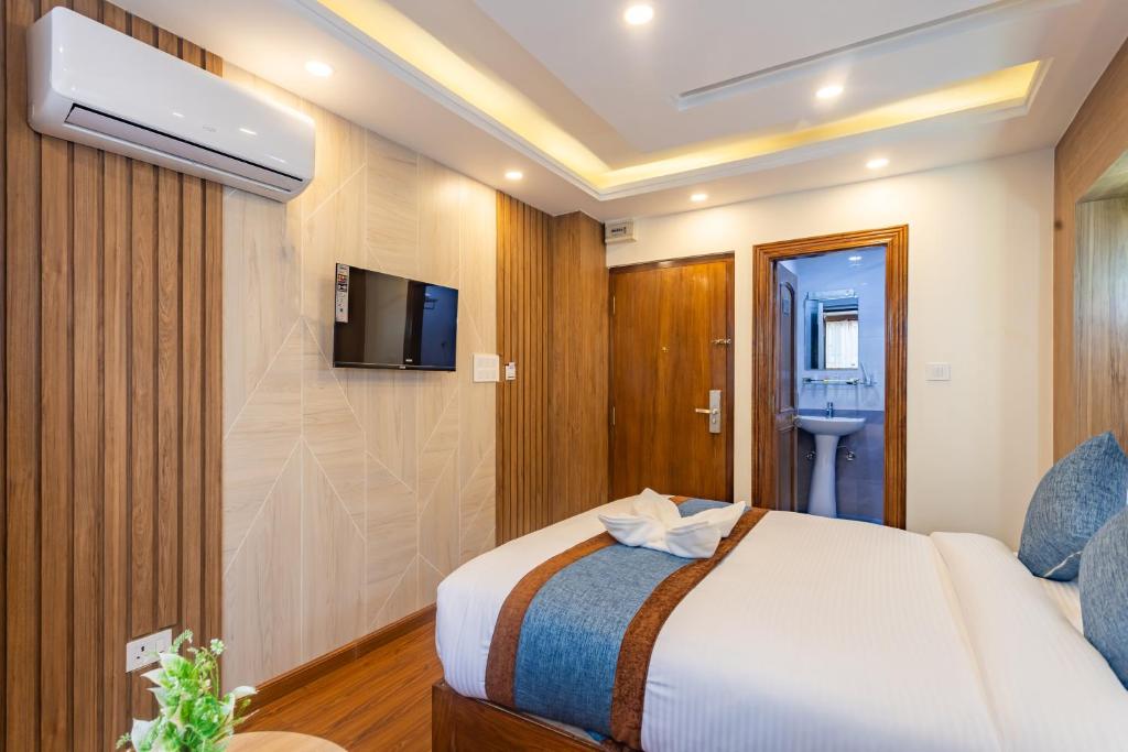 Postel nebo postele na pokoji v ubytování Airport Diana Hotel