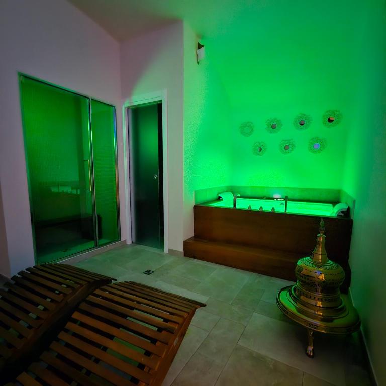 Postel nebo postele na pokoji v ubytování VOLPE E UVA Winesuites & Spa