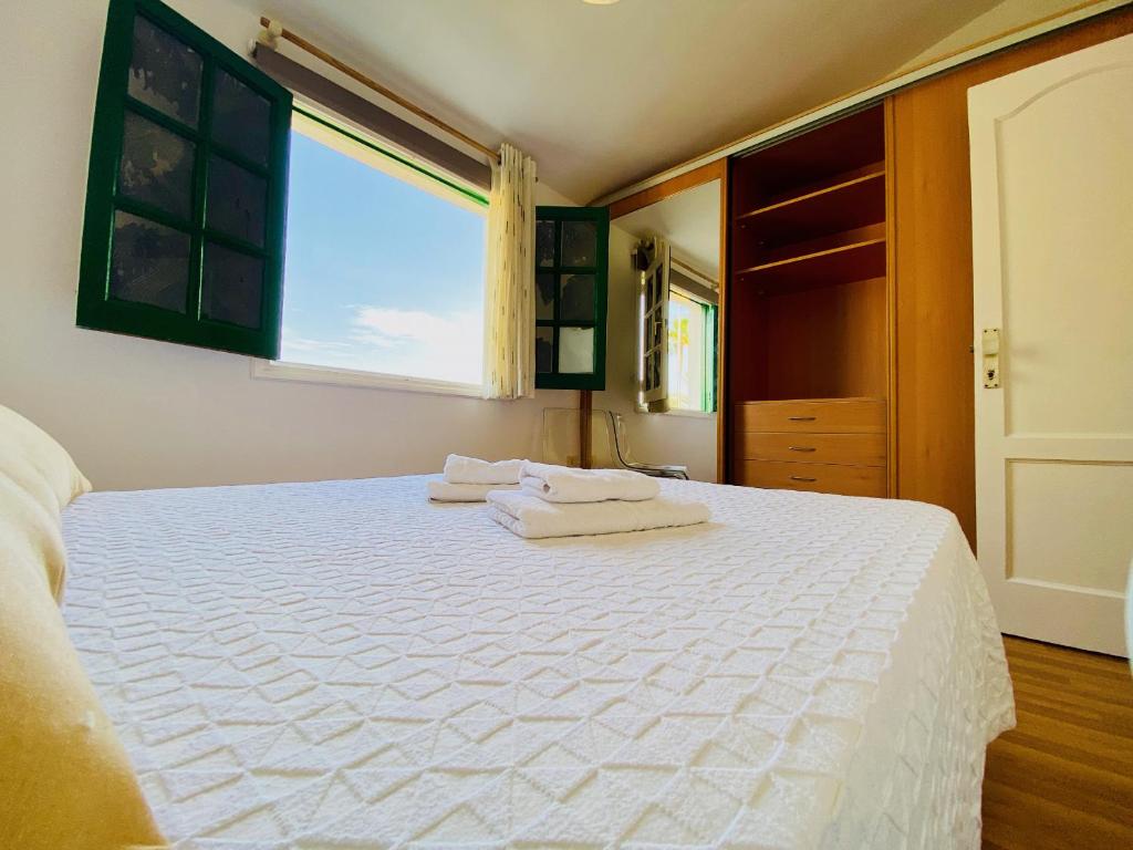Postel nebo postele na pokoji v ubytování Cozy and Sunny Bungalow in Maspalomas