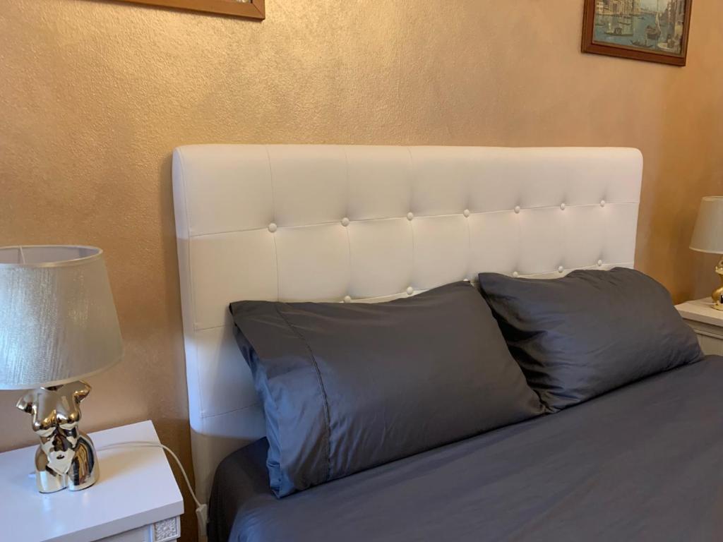 Postel nebo postele na pokoji v ubytování PRINCIPE ROOMS