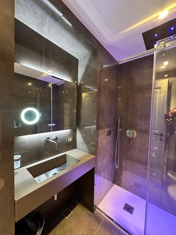 Łazienka w obiekcie Caruso Place Boutique & Wellness Suites