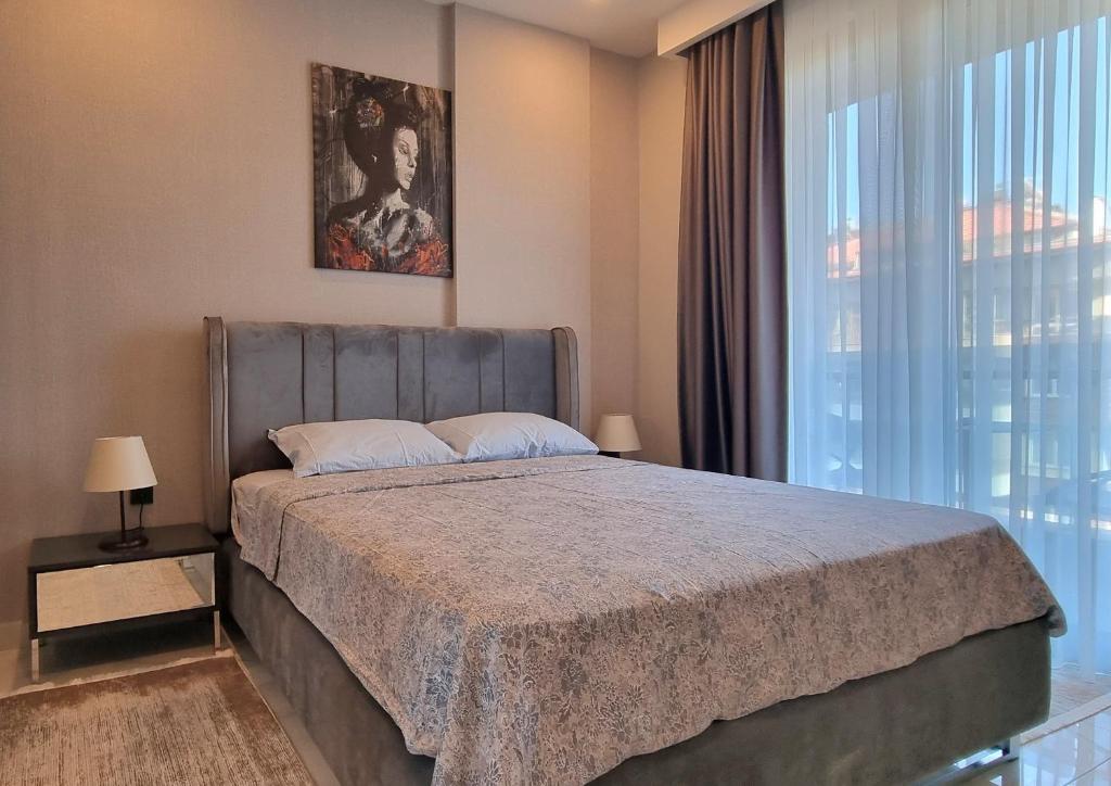 Postel nebo postele na pokoji v ubytování Apartment Cleopatra beach