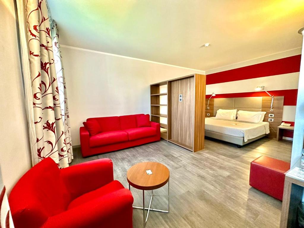 Postel nebo postele na pokoji v ubytování Hotel Del Parco