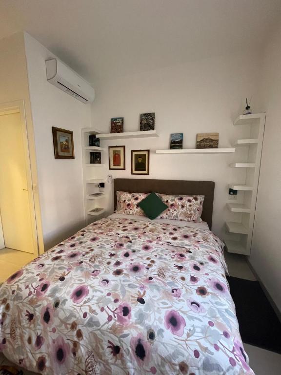 Postel nebo postele na pokoji v ubytování Fiera-Nemo