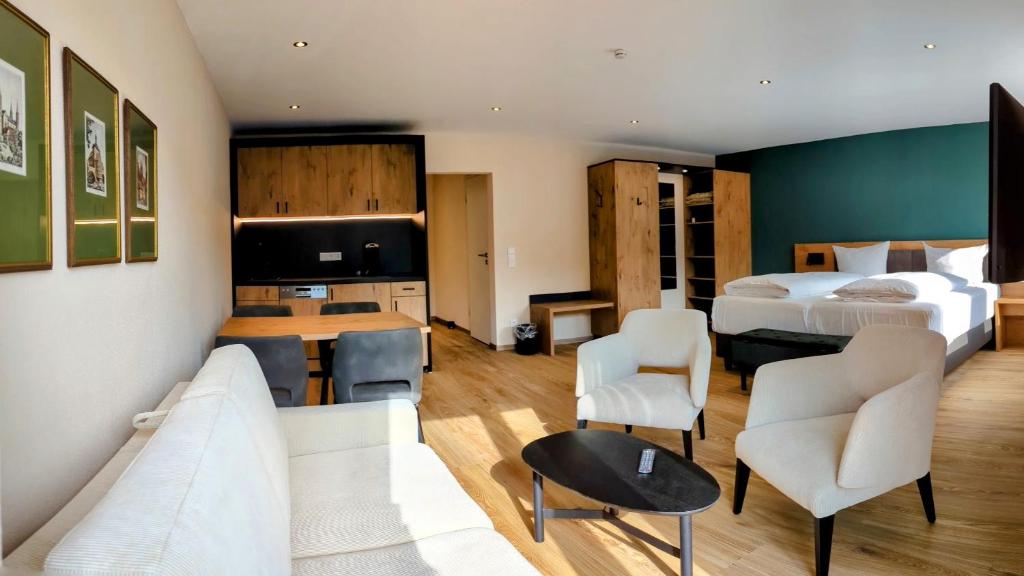 Posezení v ubytování Hotel Brauerei Gasthof Höhn