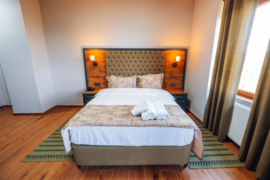 Postel nebo postele na pokoji v ubytování Mysia Olympos Hotel