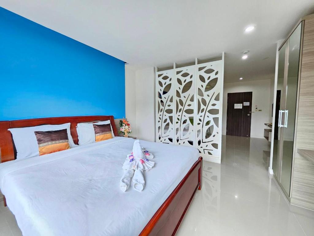Postel nebo postele na pokoji v ubytování S4 Nai Yang Beach - Near Phuket Airport