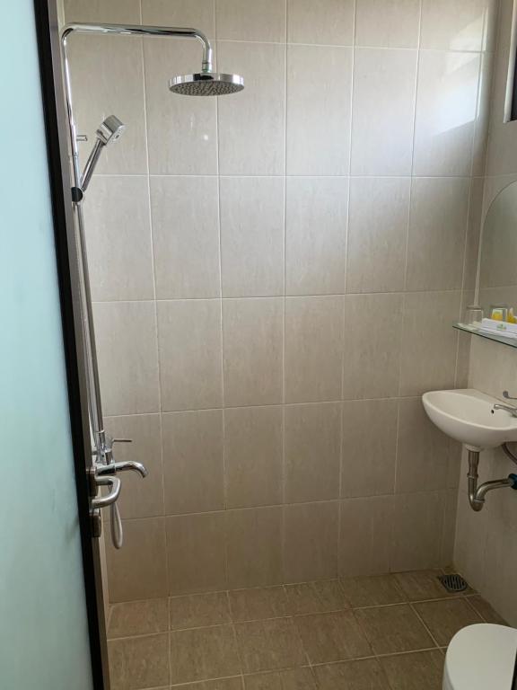 Koupelna v ubytování Selaras Inn Syariah
