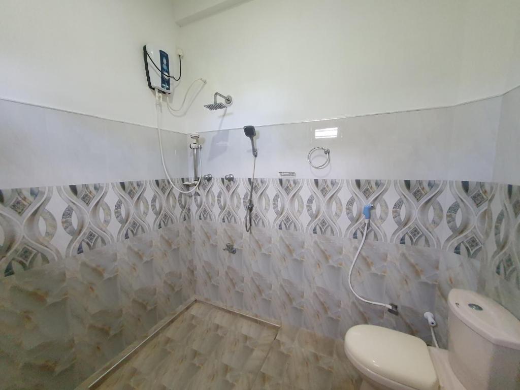 Koupelna v ubytování Sayura Beach Hotel