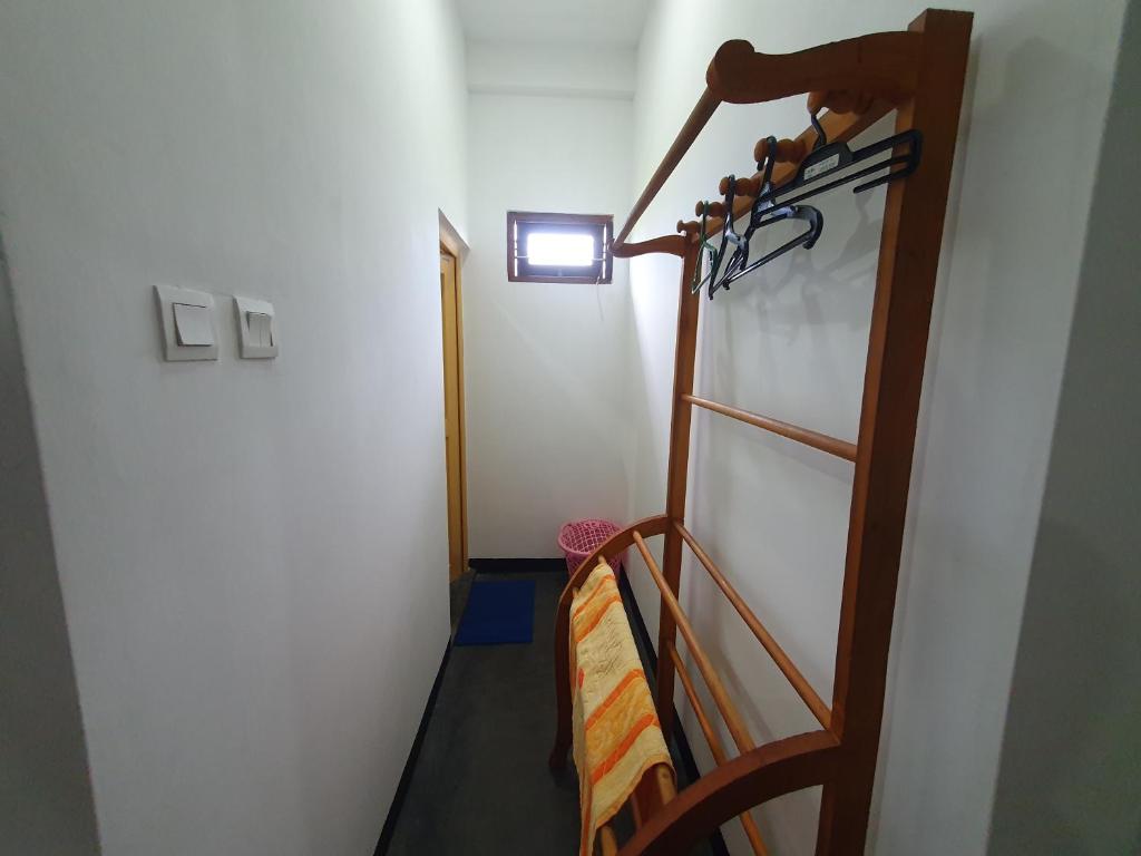 Postel nebo postele na pokoji v ubytování Sayura Beach Hotel