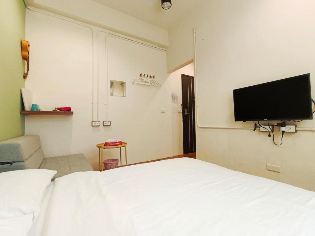 TV a/nebo společenská místnost v ubytování 東海小時光 Tong Hai Time Homestay