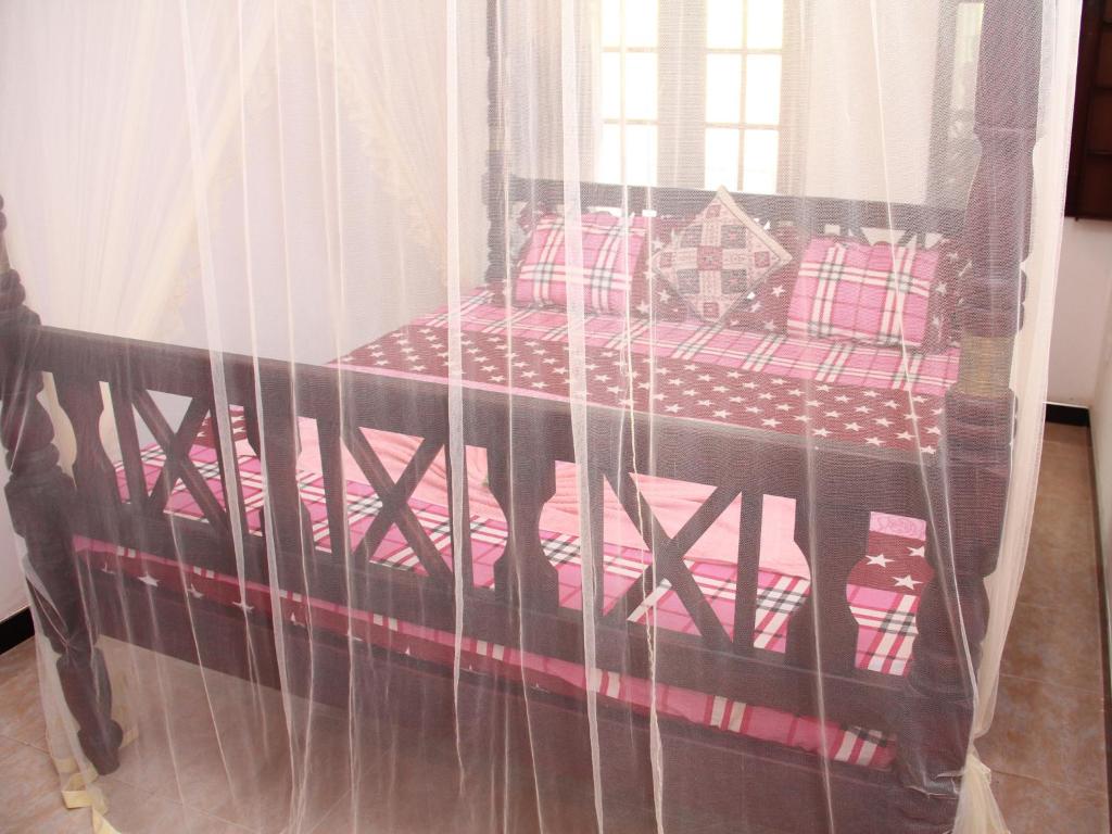 Postel nebo postele na pokoji v ubytování Sethun House