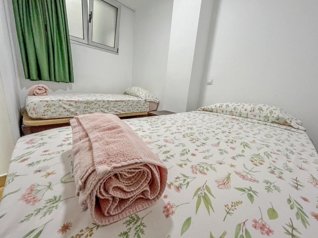 Posteľ alebo postele v izbe v ubytovaní 403 APARTAMENTO VISTA MAR con BALCÓN