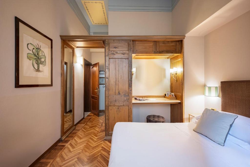 Postel nebo postele na pokoji v ubytování Guest House Morandi