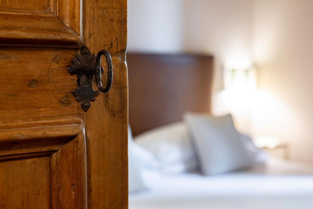 Postel nebo postele na pokoji v ubytování Guest House Morandi