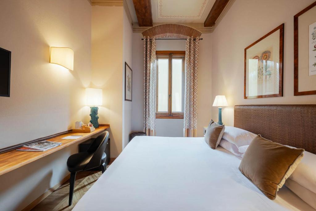 Postel nebo postele na pokoji v ubytování Guest House Morandi