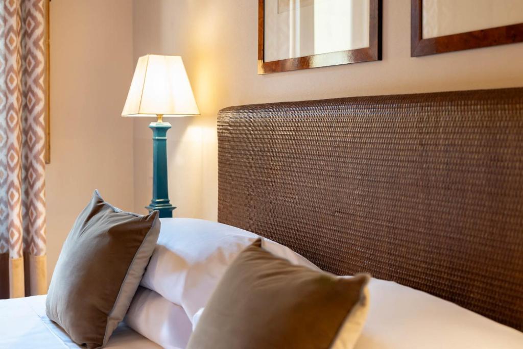 Postel nebo postele na pokoji v ubytování Guest House Morandi