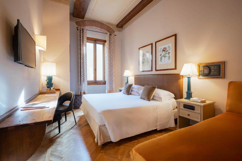 Postel nebo postele na pokoji v ubytování Guest House Morandi