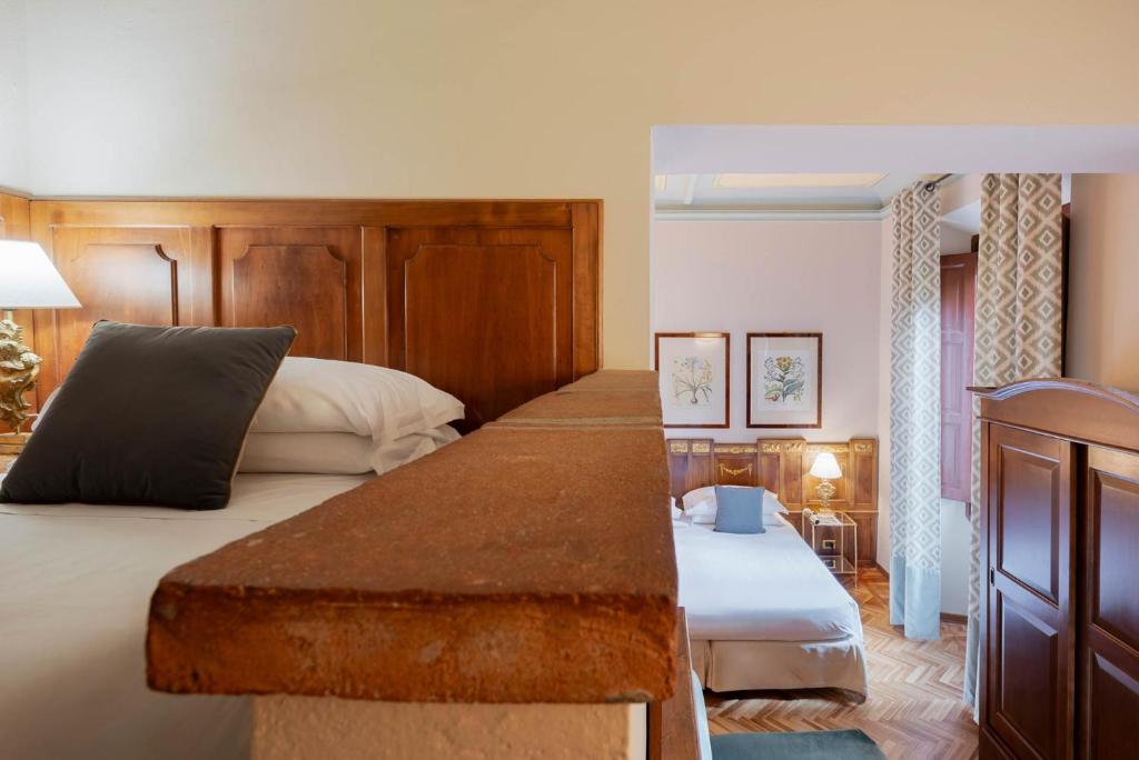 Postel nebo postele na pokoji v ubytování Guest House Morandi