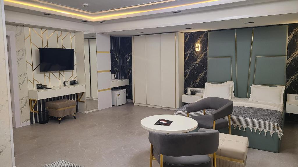 Shedevr Plaza Navoiy - Deluxe Familienzimmer
