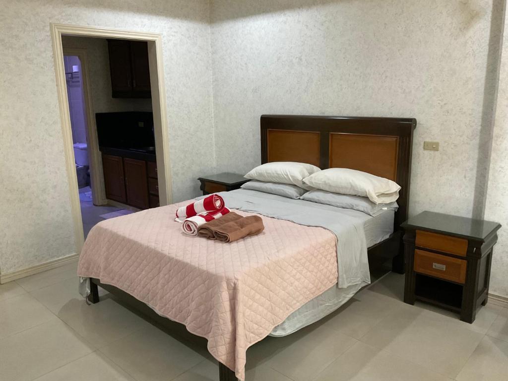 Postel nebo postele na pokoji v ubytování Bourbon street apts