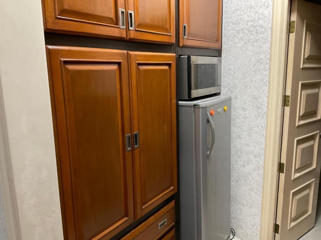 Kuchyň nebo kuchyňský kout v ubytování Bourbon street apts