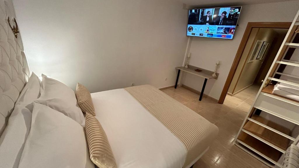Postel nebo postele na pokoji v ubytování Piso Zentro Calatayud