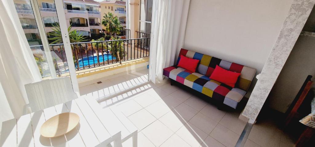 Posezení v ubytování Golf park , 1 bedroom pool view