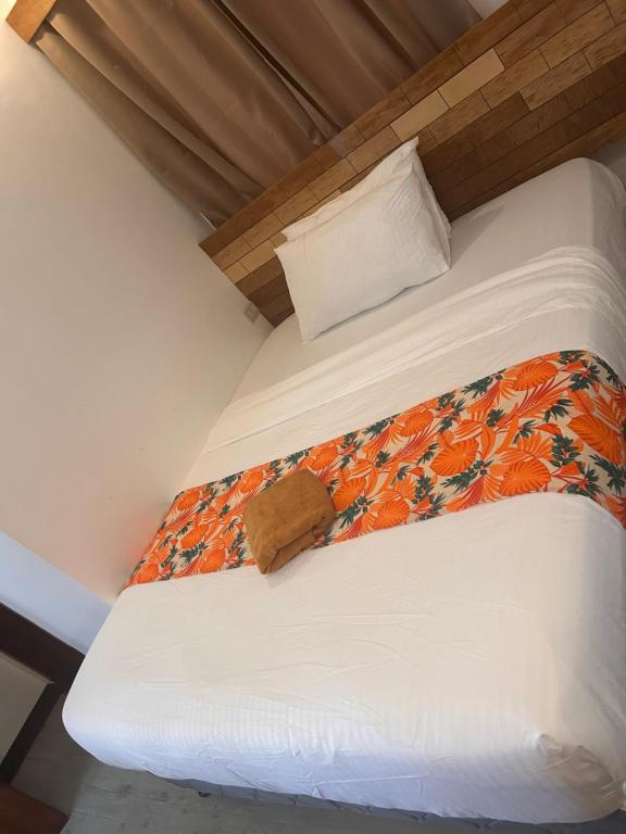Voodi või voodid majutusasutuse Puyo Suites Homestay toas