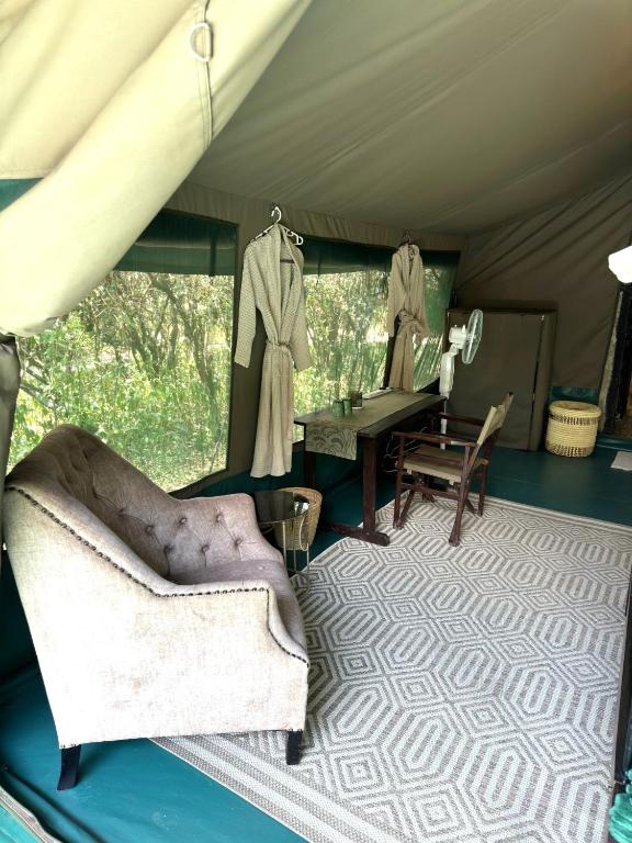 Posezení v ubytování Olkinyei Mara Tented Camp
