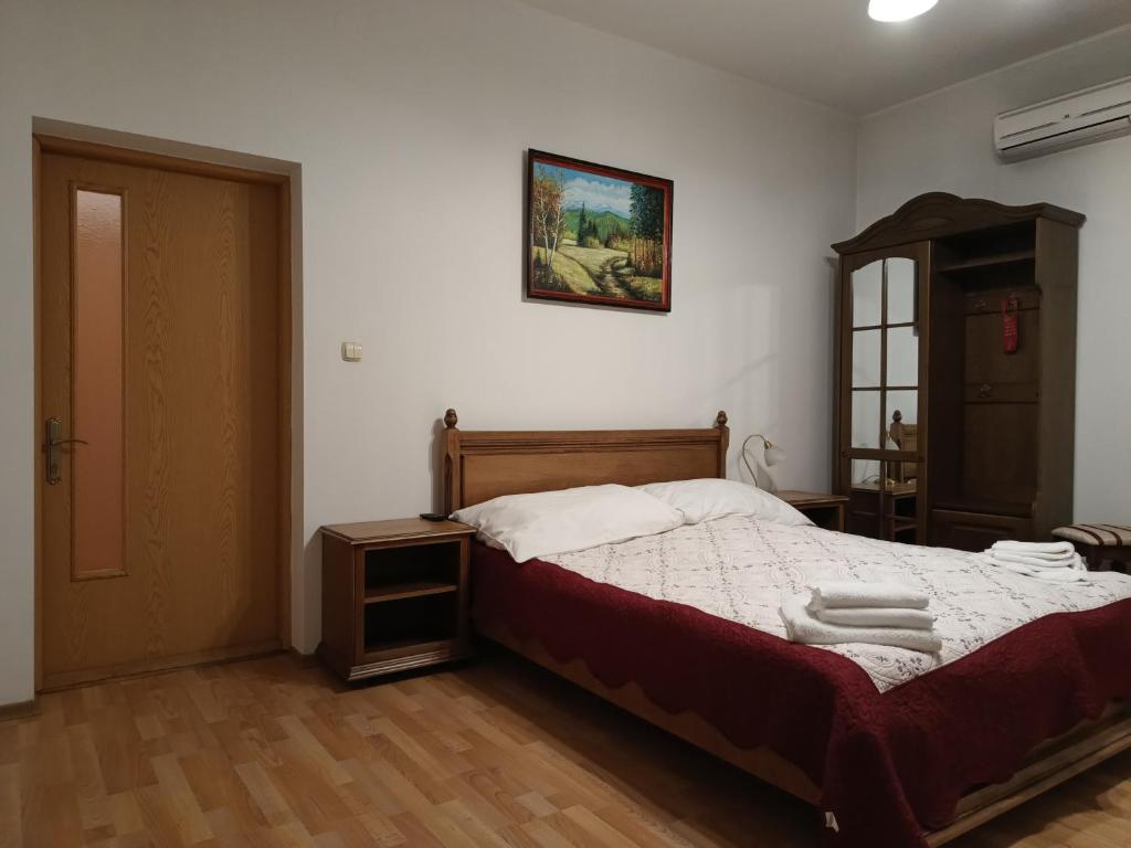 Postel nebo postele na pokoji v ubytování Вілла Токай